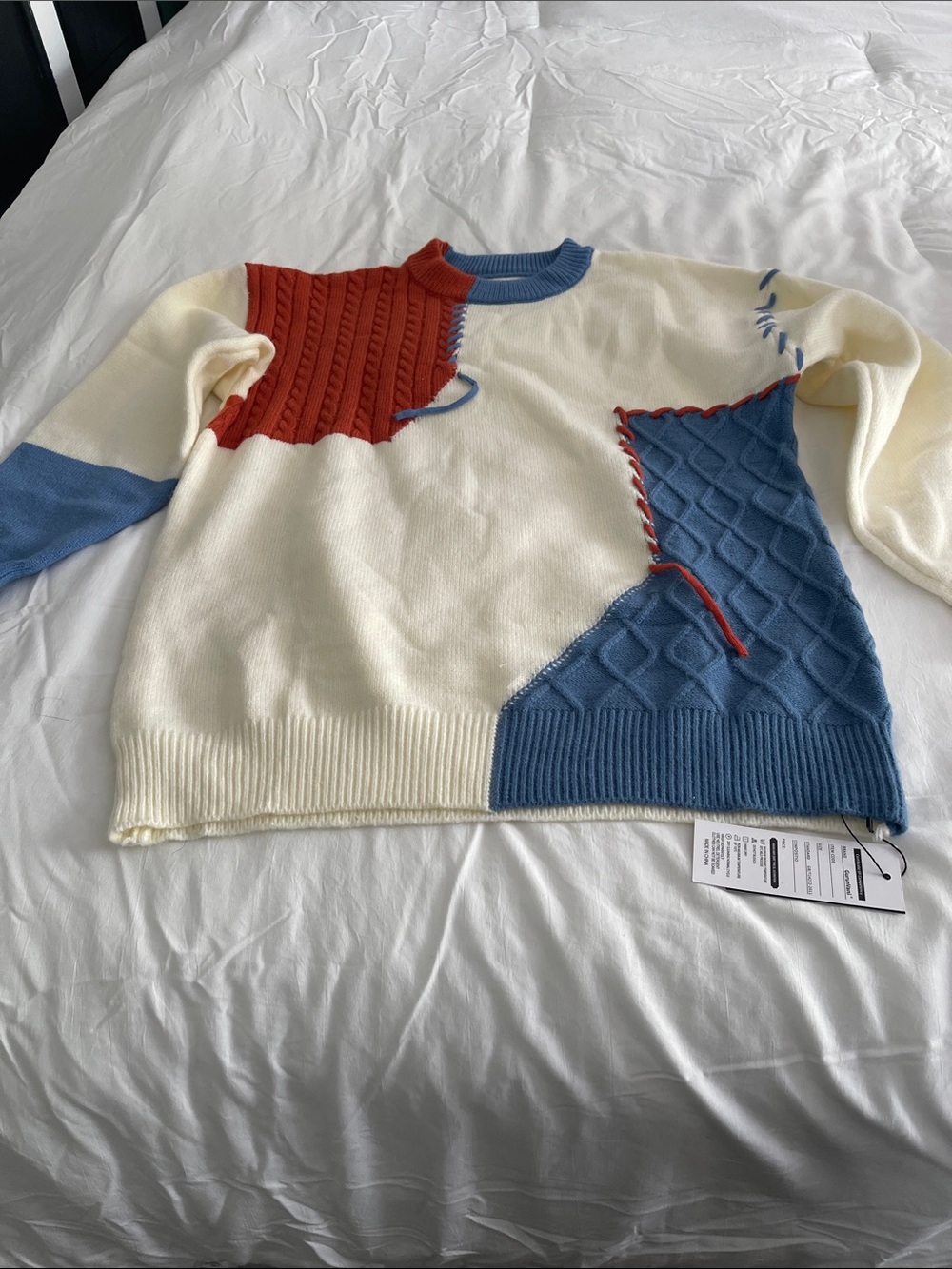 Cream Crewneck Sweater with Blue and Rust Patchwork Details